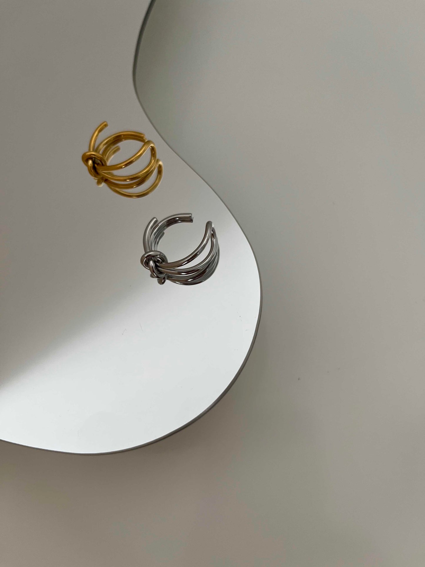 Verknoteter Ring Amber